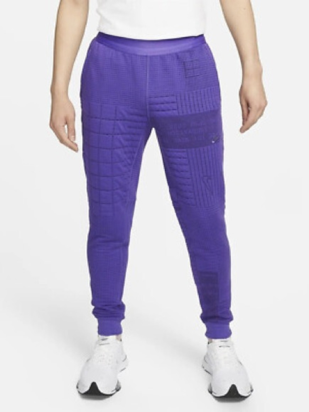 Nike Sportswear Therma-FIT ADV Tech Pack pants in purple